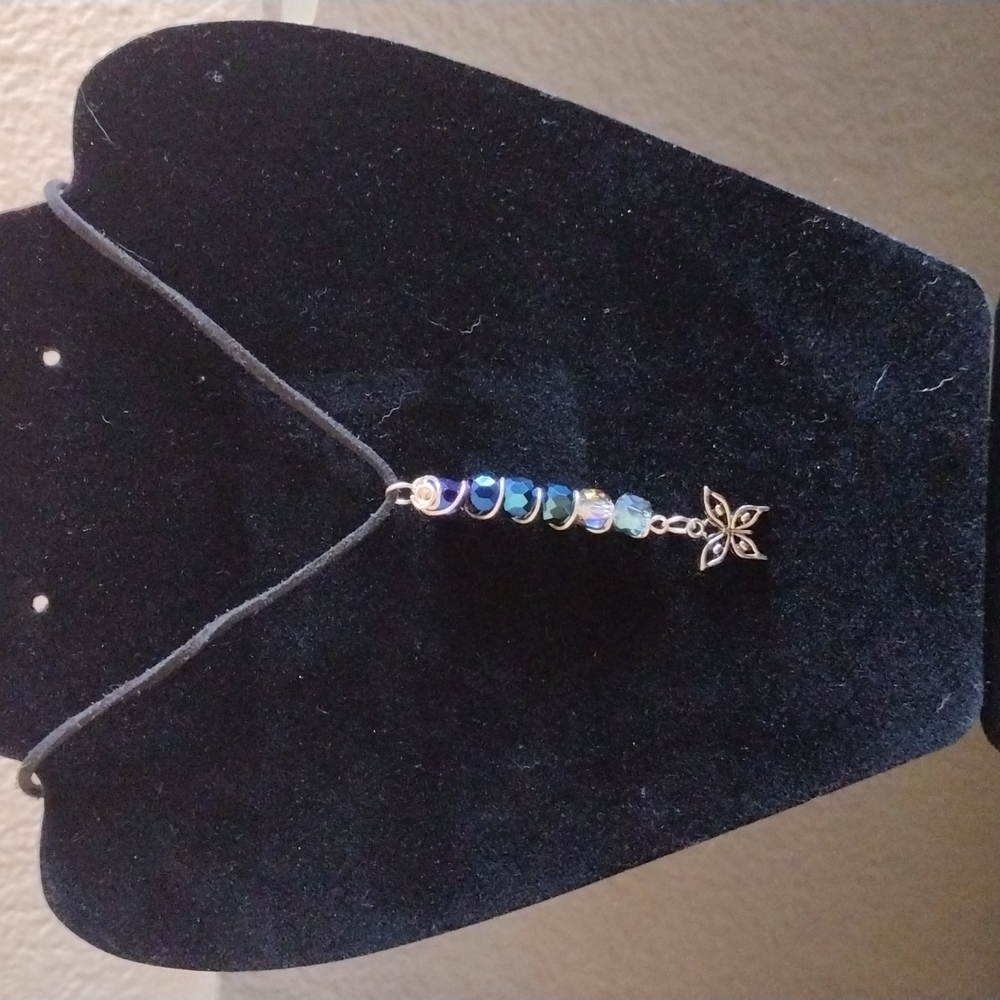 Wire wrapped crystal beads with butterfly pendant